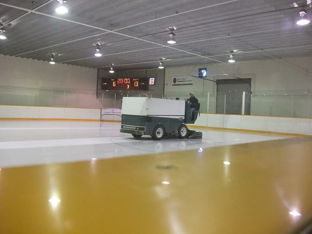 Ice resurfacer at work in a small community arena