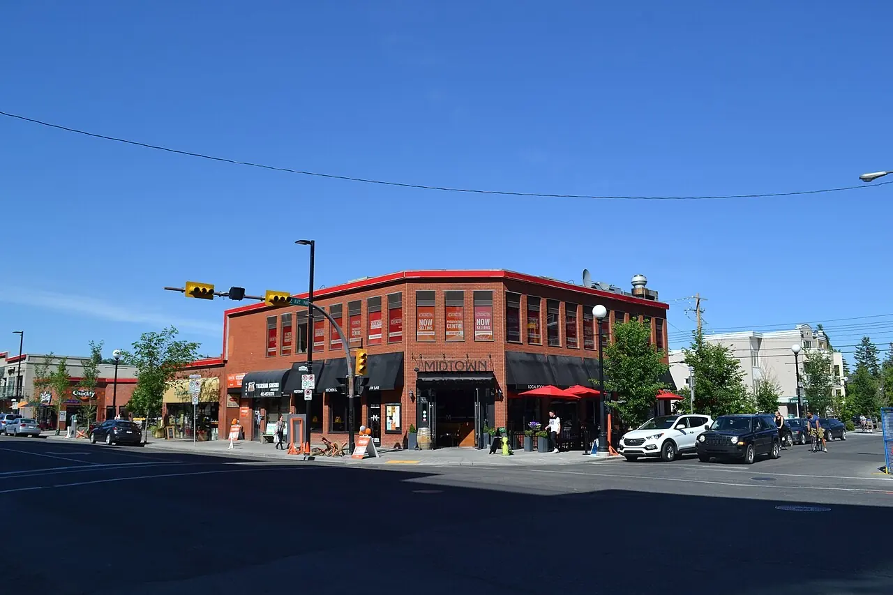 Brick commercial building at a Kensington intersection in Calgary