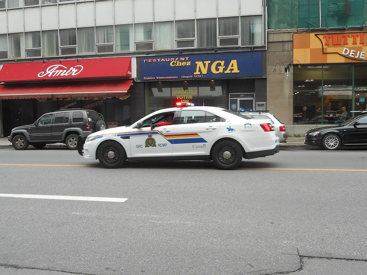 RCMP cruiser on a downtown street