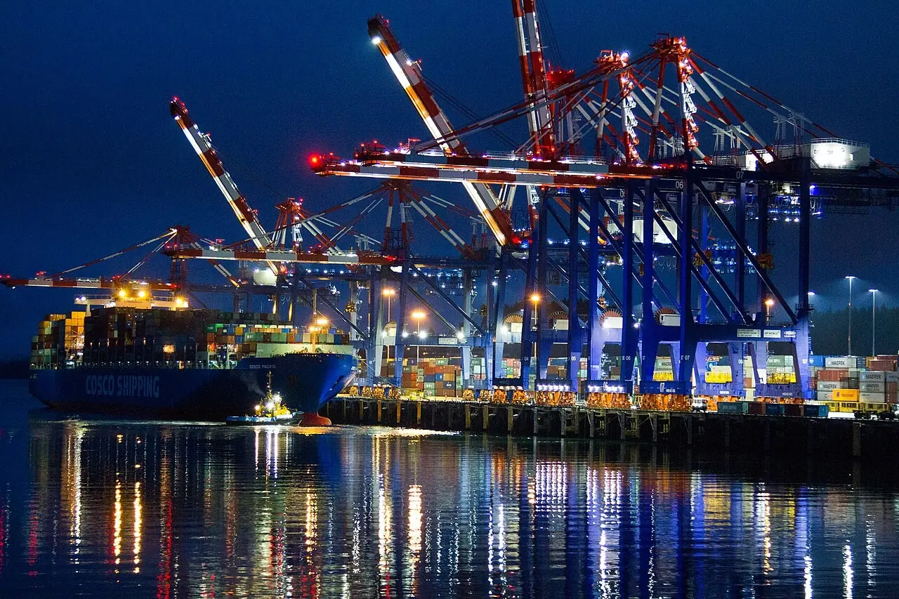 Container terminal lit up at night in Prince Rupert