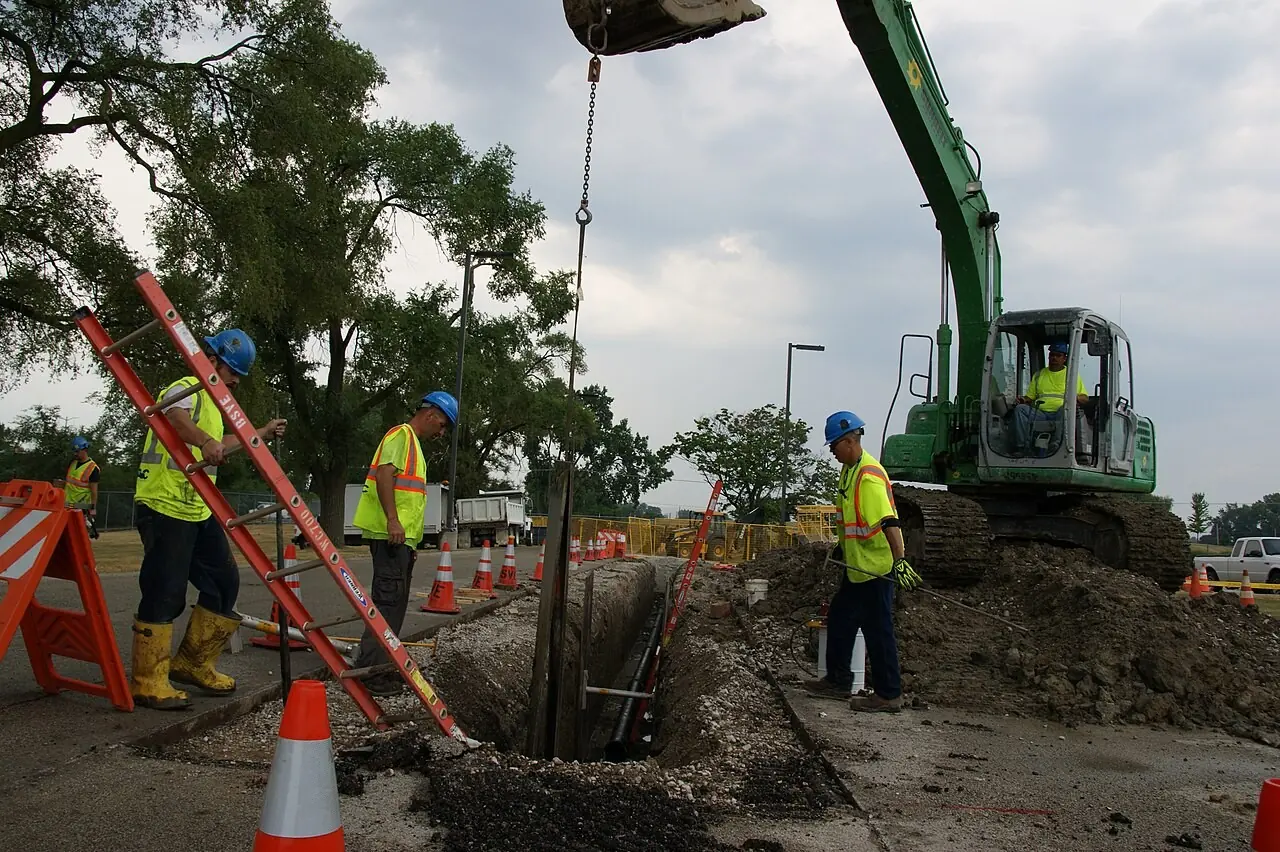 Crew working at a water main excavation