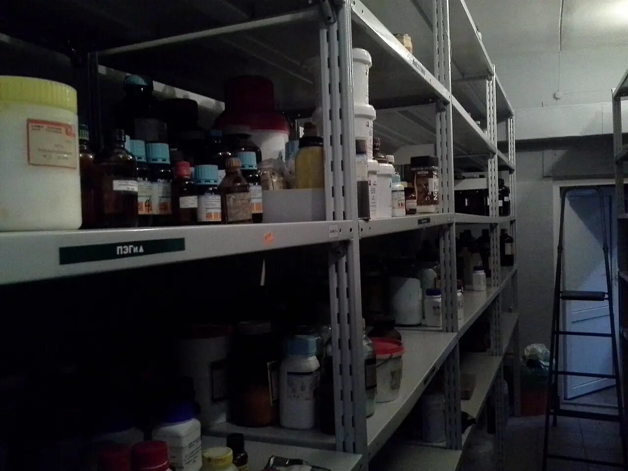 Metal shelving in a chemical storeroom