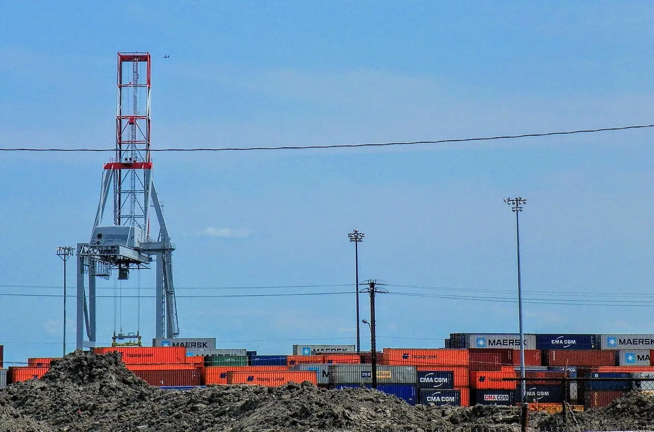 Container crane and stacked shipping containers at the Port of Montreal